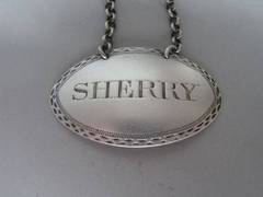 A George III Wine Label made in Newcastle circa 1780 by Langlands 
Robertson.