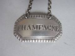 A George IV Wine Label made in London in 1821 by Charles Rawlings.