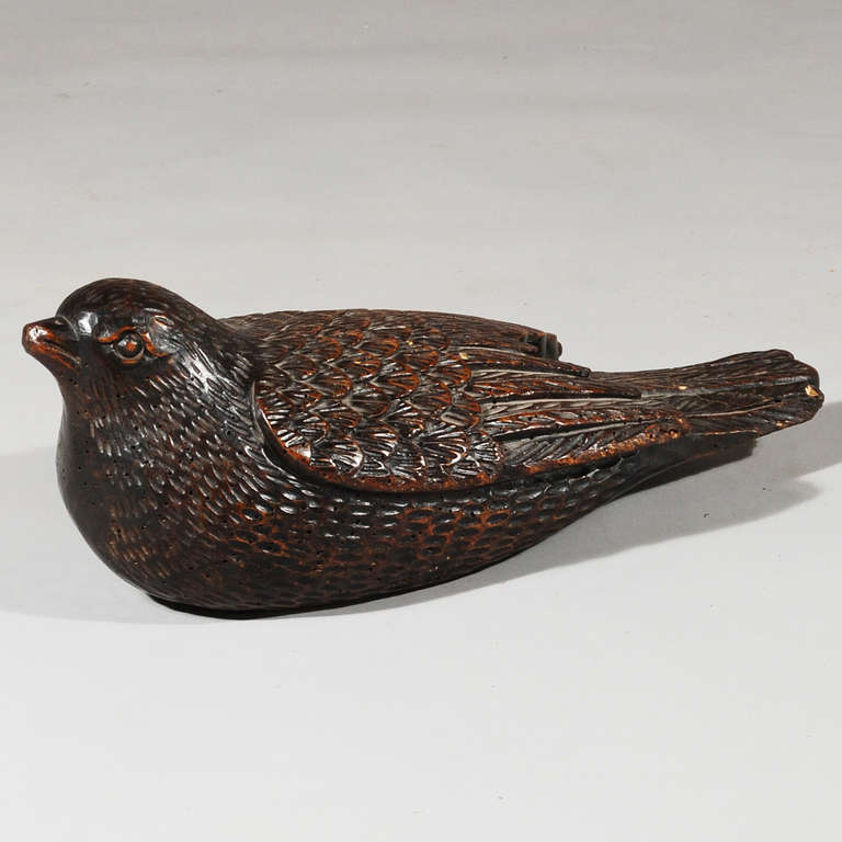 A beautifully worked carved oak nightjar - beautiful original patination and colour.