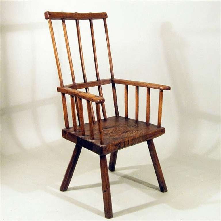 An 18th century antique comb back Windsor chair in ash.