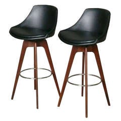 Pair of Walnut Bar Stools with Chrome Foot Rest Designed by John Yellen