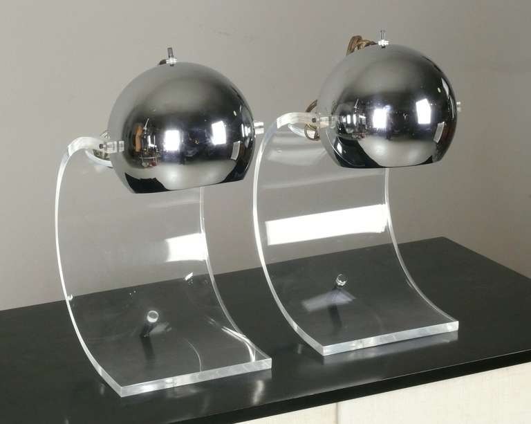 Pair of 1960s lucite & chrome table lamps with adjustable heads by Robert Sonneman.