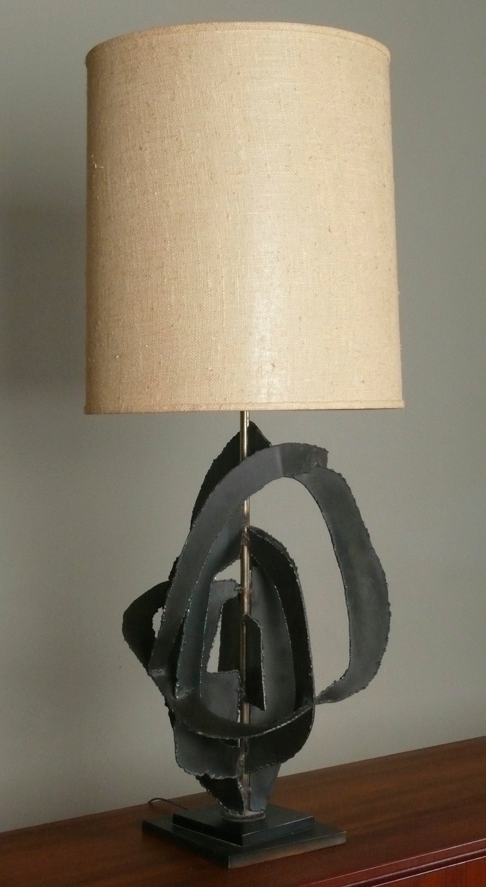 Torch-cut steel lamp designed by Harry Balmer for the Laurel Lamp Company. Shown with original shade (optional).