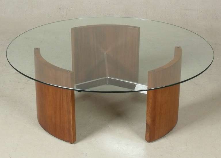 Late 1960s walnut and chrome base cocktail table by Selig. New Glass.