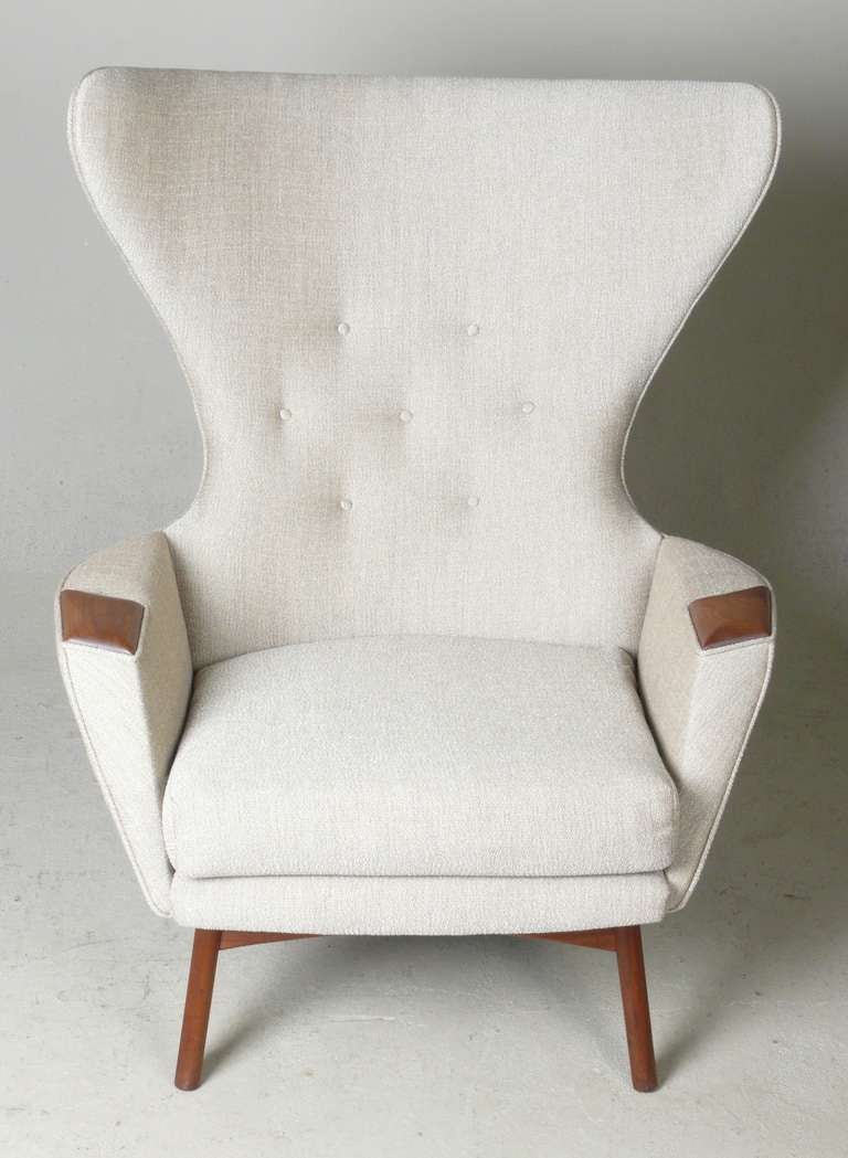 C. 1965 modern wing chair on an oiled walnut base with walnut arm pads by Adrian Pearsall for Craft Associates. New cotton/linen blend upholstery.