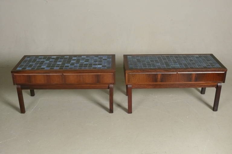 Pair of Danish, custom-made, 1960s side tables in Brazilian rosewood with ceramic tile inlay surface, each with 2 drawers. One piece is slightly (.5