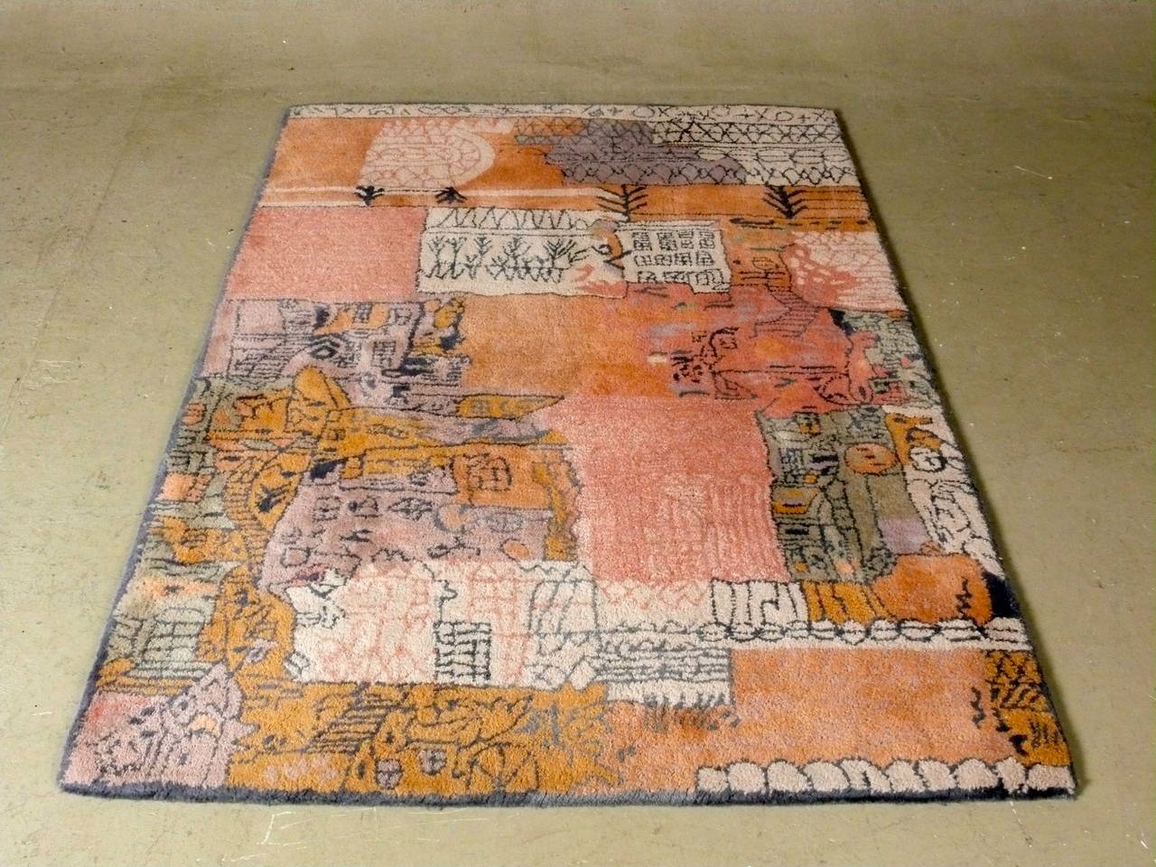 Thick pile, 100% wool rug with beautifully muted (slightly lighter than shown in photos) colors from Ege's Paul Klee collection, made in Denmark, circa 1975.