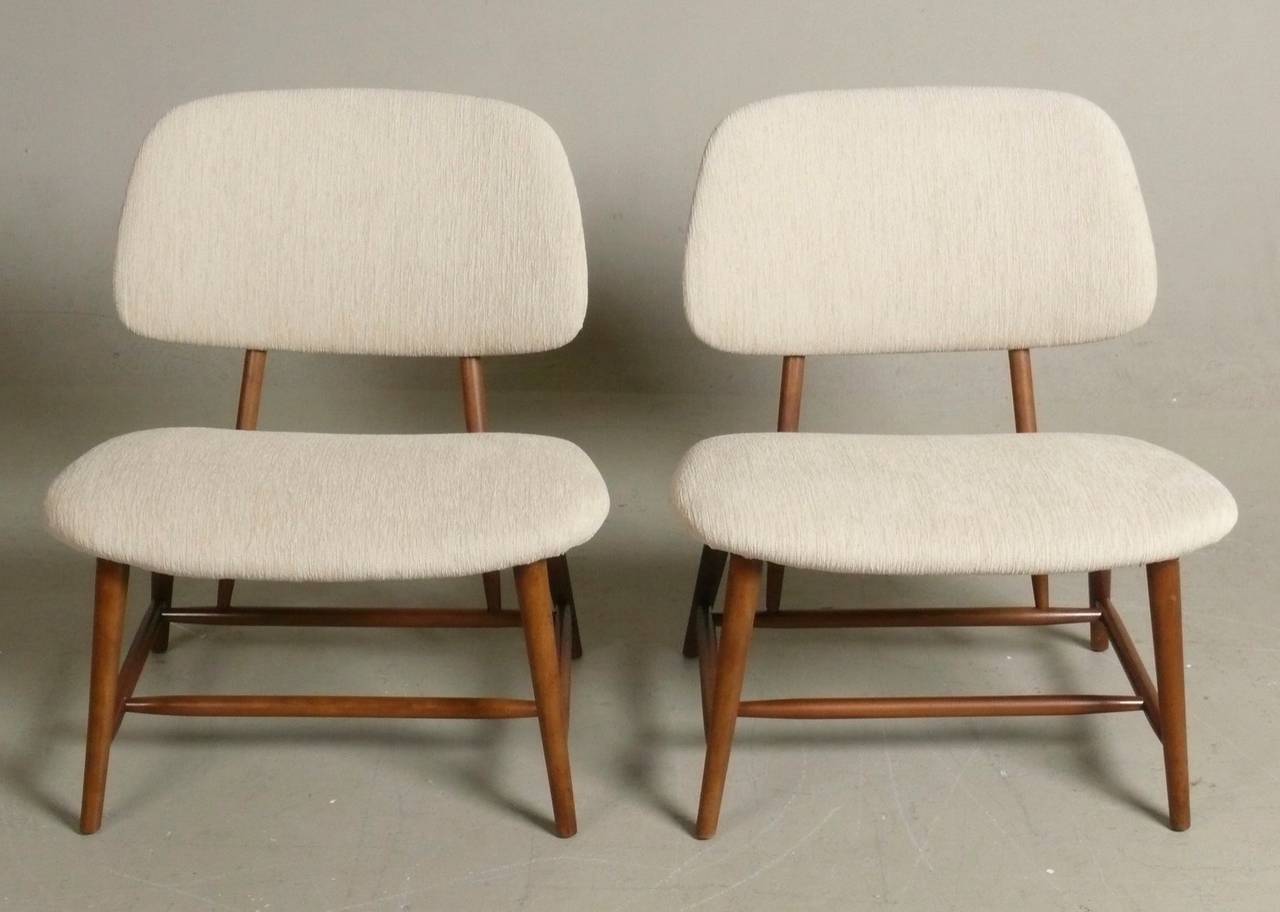 Pair of 1950s Te Ve chairs designed by Alf Svensson for Dux, Sweden.  Beech frames with brass hardware.  New Knoll upholstery.