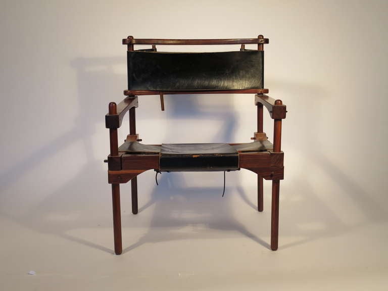 Rare, handsome solid rosewood safari chair by Don Shoemaker. The 