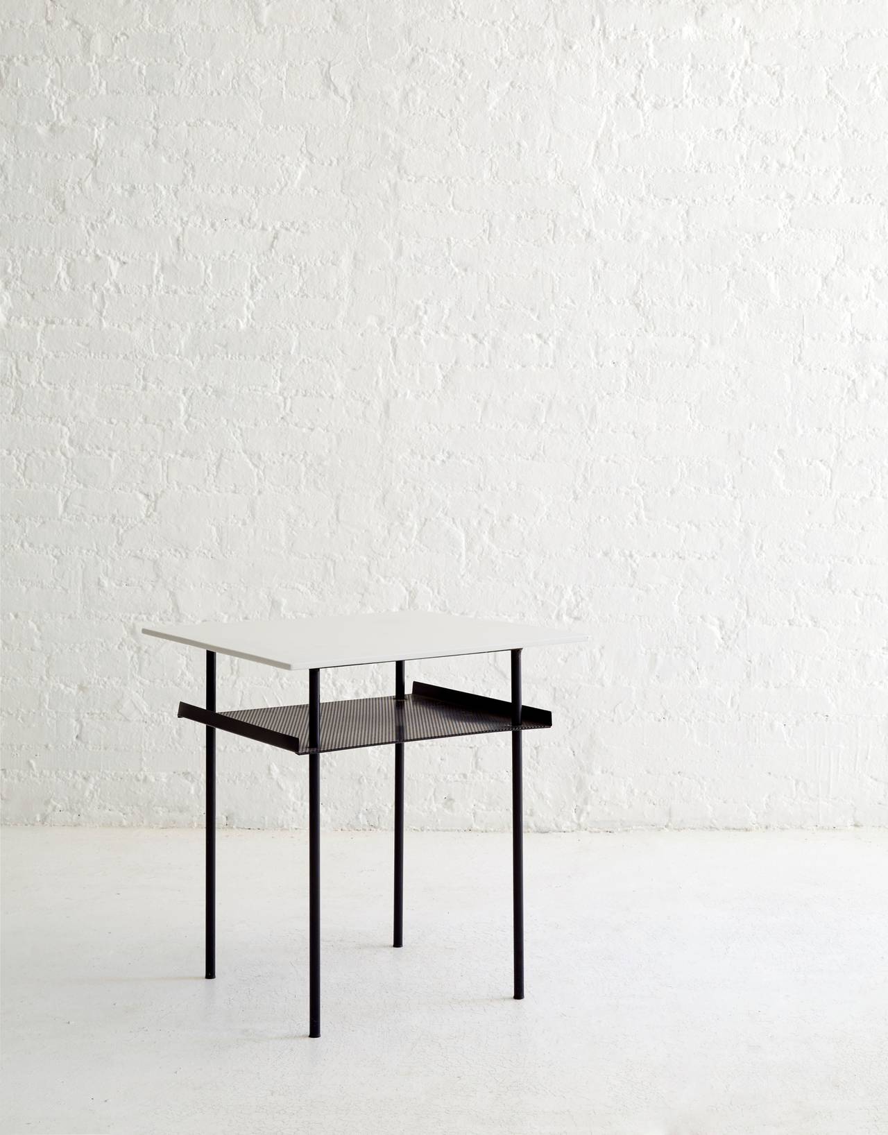 Wim Rietveld side table for Auping with a rare perforated metal shelf.