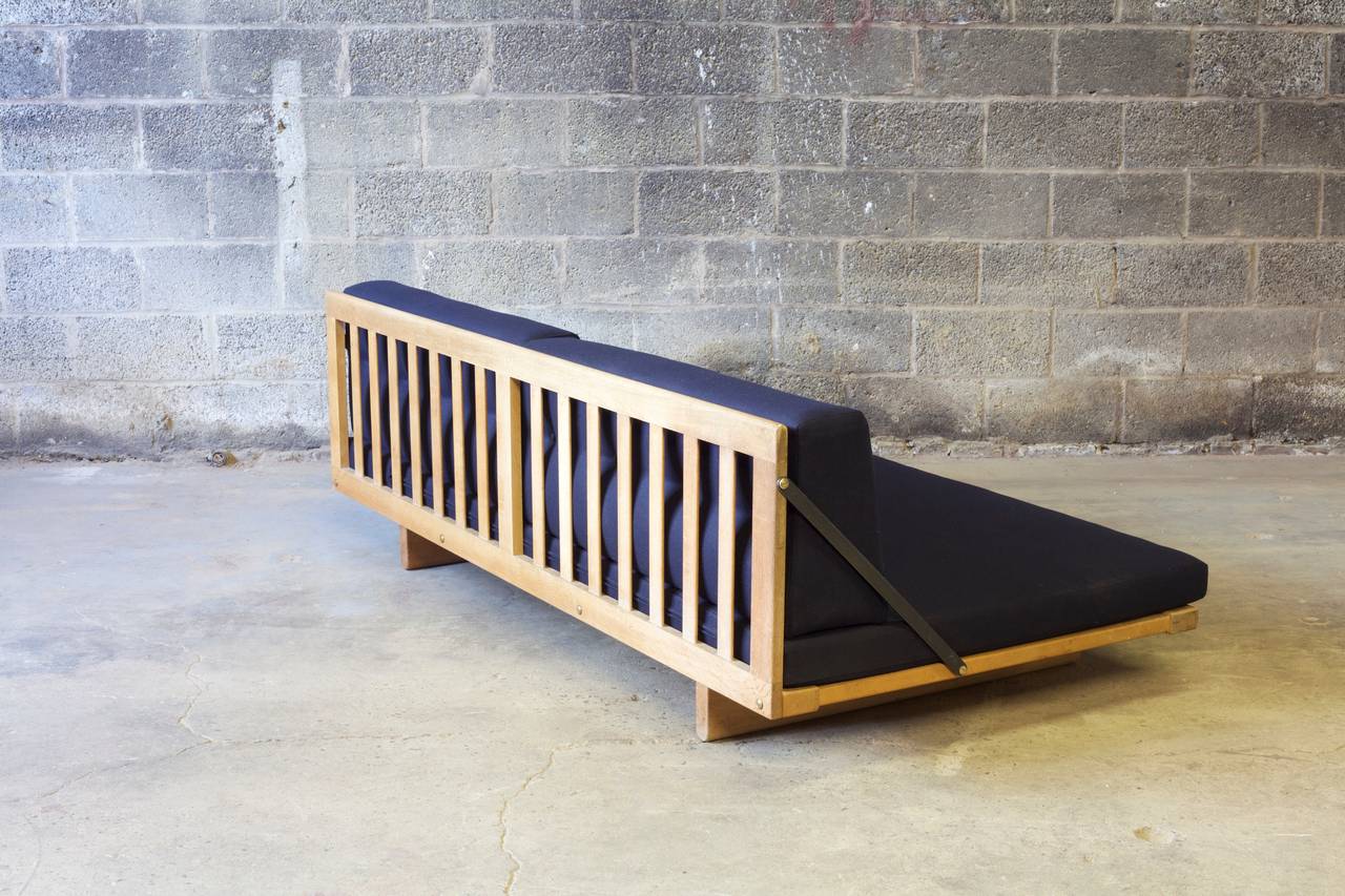 Børge Mogensen deep seated oak daybed with slats in seat and back. Loose cushions in back newly upholstered with fine wool and tufting.