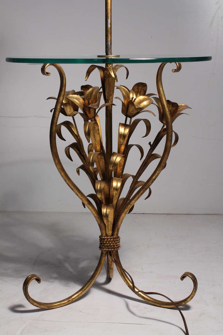 Toleware floor lamp table with gilded flowers design. Made in Italy. Tag attached.

About 23