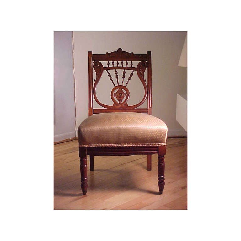 Early aesthetic American Renaissance ball and Stick slipper chair possibly by Davenport.