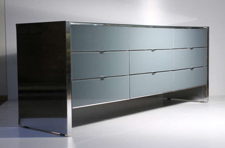 Designer O.B. Solie for Ello 9 drawer dresser or sideboard.  Glass is reverse painted in a mod blue-gray. This piece as it stands is all original and shows some signs of wear from use.