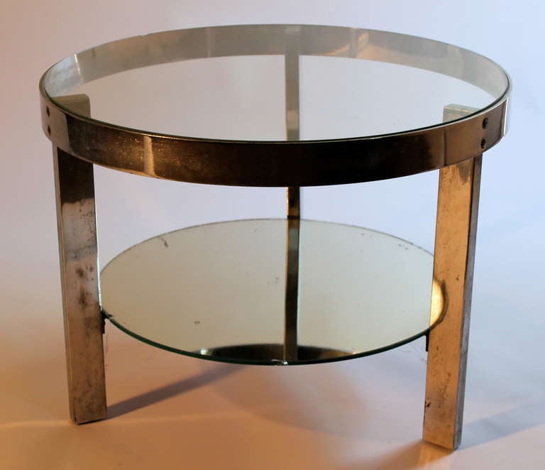A signed Treitel Gratz Coffee Table. The design attributed to Donald Deskey, circa 1928. Constructed of chrome plated steel, mirrored glass and glass. All the parts are original. Height 18
