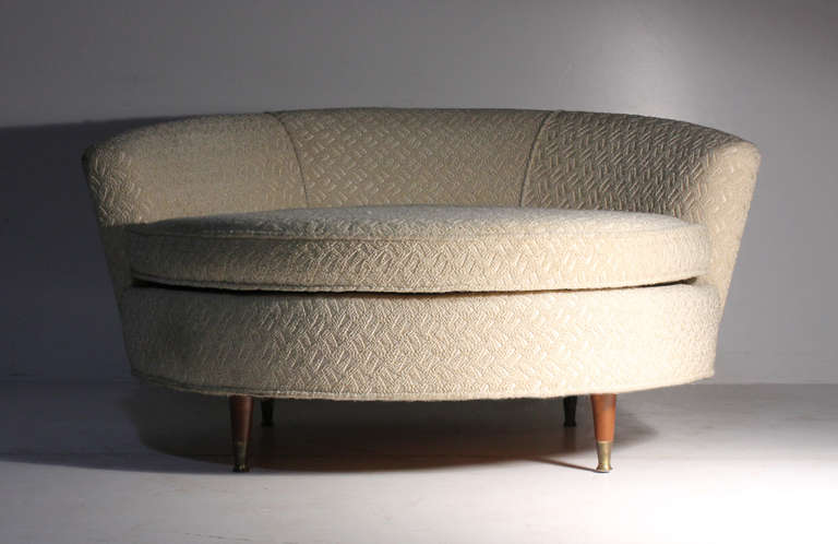 Oversized vintage Ufo sofa chair in style of Milo Baughman. No labels attached. Beautiful brass feet. 

About 50