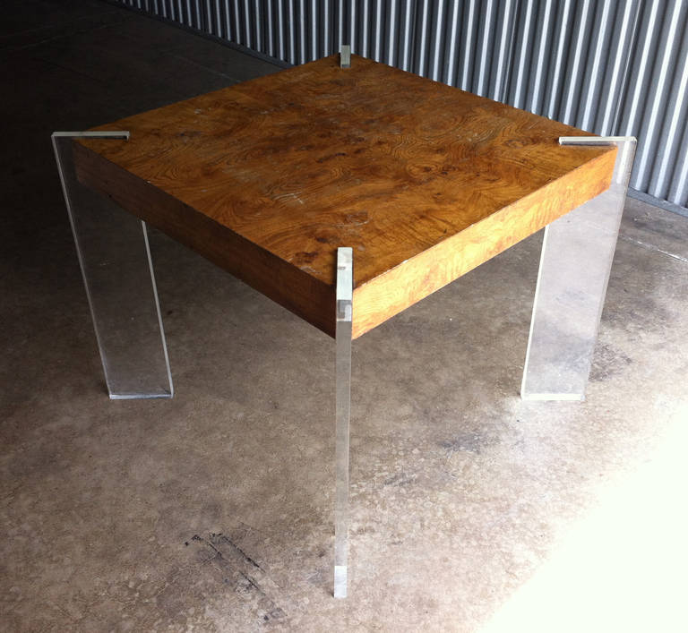 Vintage burl dinette table with acrylic legs.
A rare dining table form for this design.
Manner of Milo Baughman

Measures: 34