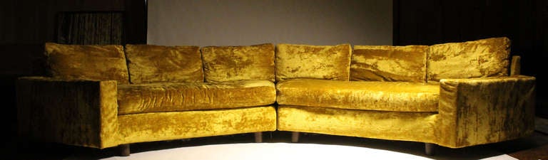 Vintage Sofa in a chartreuse-like (with warm reddish tones)  color velvet. Very soft. This sofa retains a tag from Shawnee-Penn MFG. So it is truly period as the fabric type and color would suggest. This company appears to have produced designs for