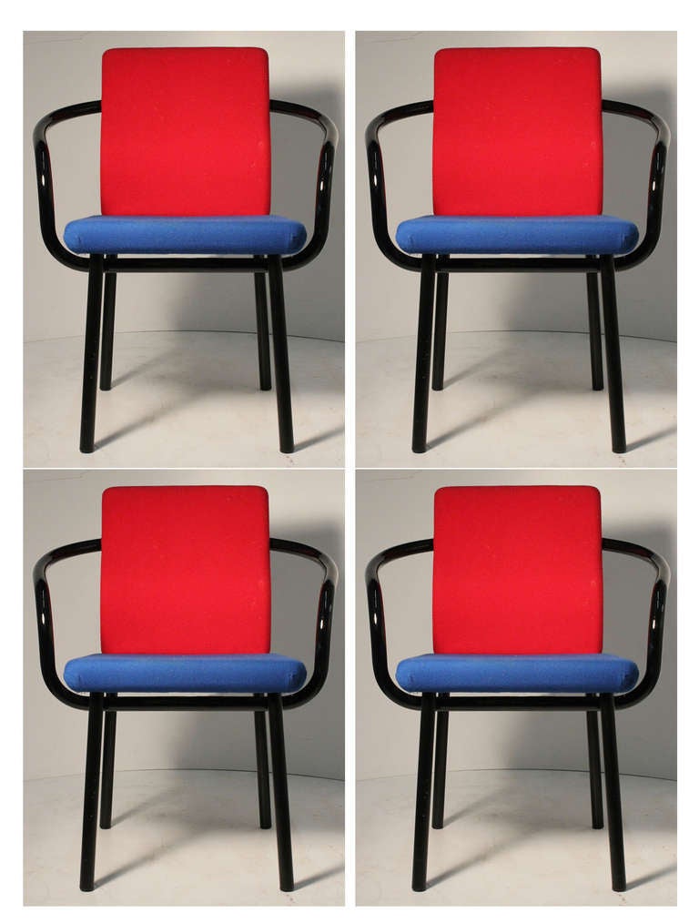 A set of 4 armchairs by Sottsass. Knoll labels attached.