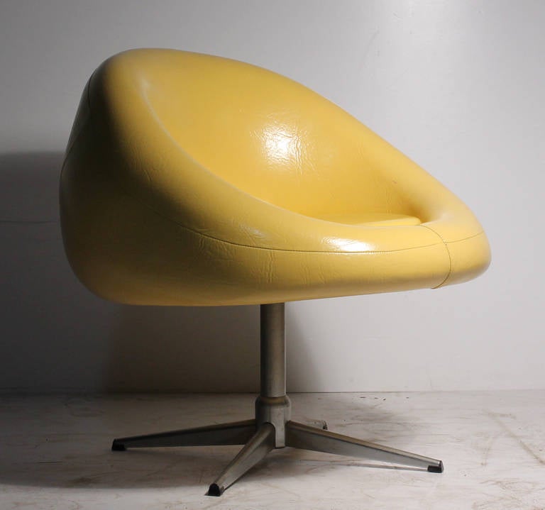 Pair of yellow 1970s chairs attributed to Overman. No identifying labels attached.
A couple marks on the vinyl. circled in red on last 2 photos.

about 28