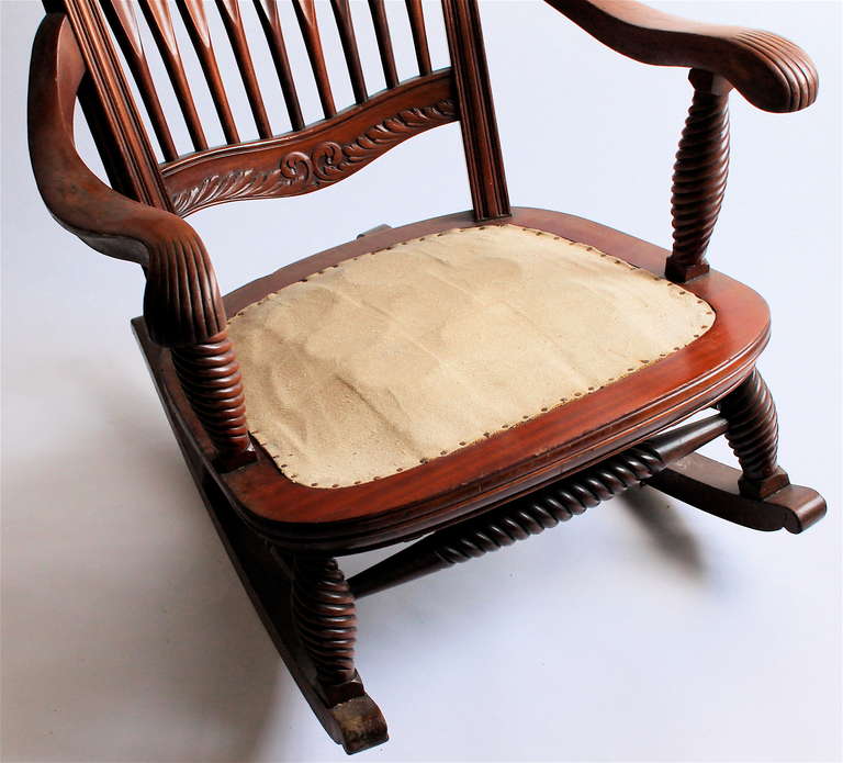 American Renaissance Davenport Carved Mahogany Rocker In Excellent Condition In Chicago, IL