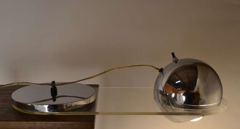 Unusual form not often seen in the Modernist idiom, lucite and chrome Piano lamp, marked 