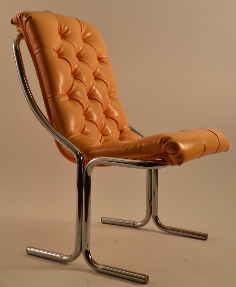 Tubular Chrome Tufted Vinyl Armless Chair