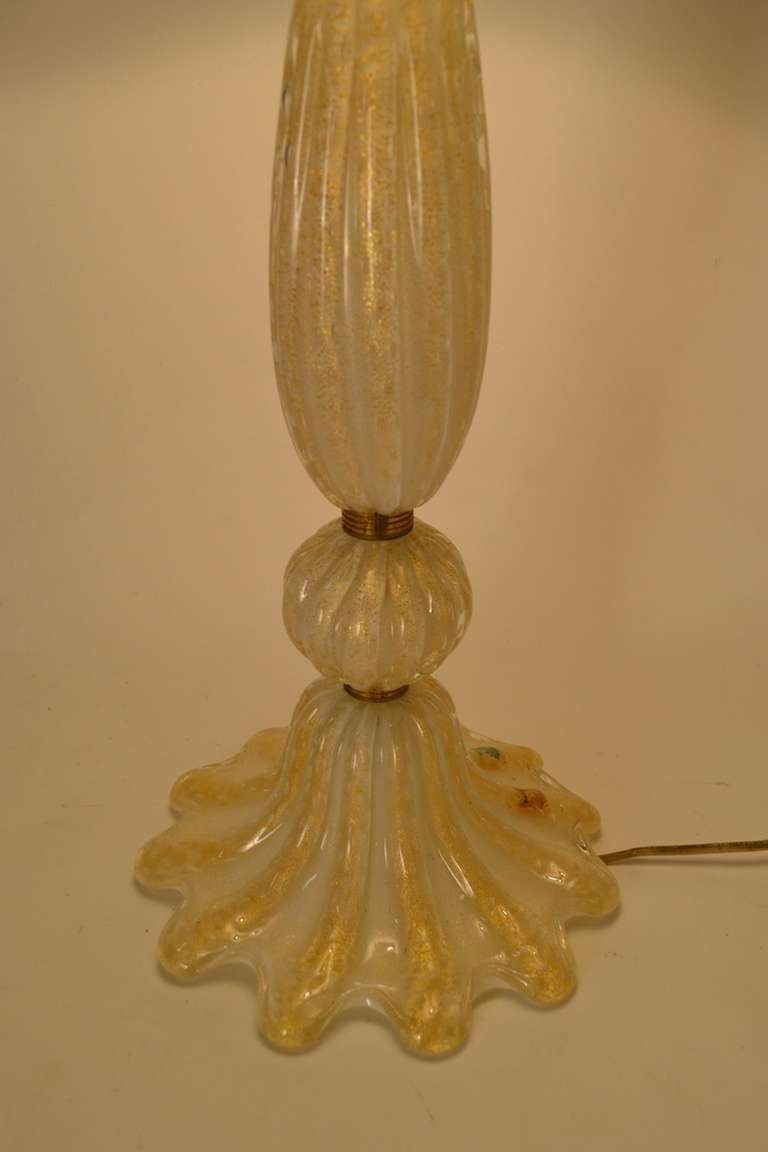 Gold inclusion ( Avventurina) technique make these a very stylish and elegant pair of Murano, Italian Art Glass lamps. 
Original and working condition, shades not included.
Height in listing includes harp, Height to top of socket is 24