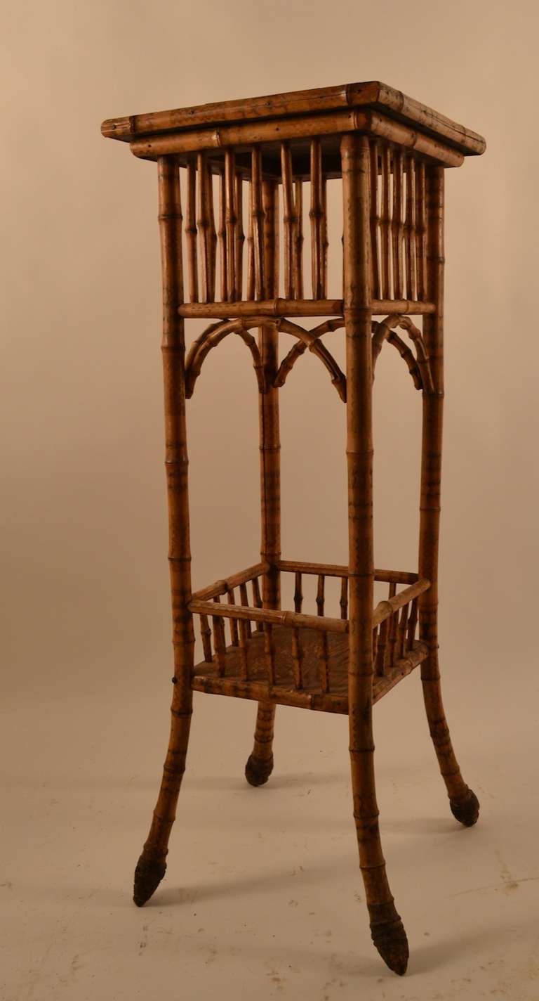 19th C Bamboo and oak plant stand  wear to the top where a potted plant sat for many years.