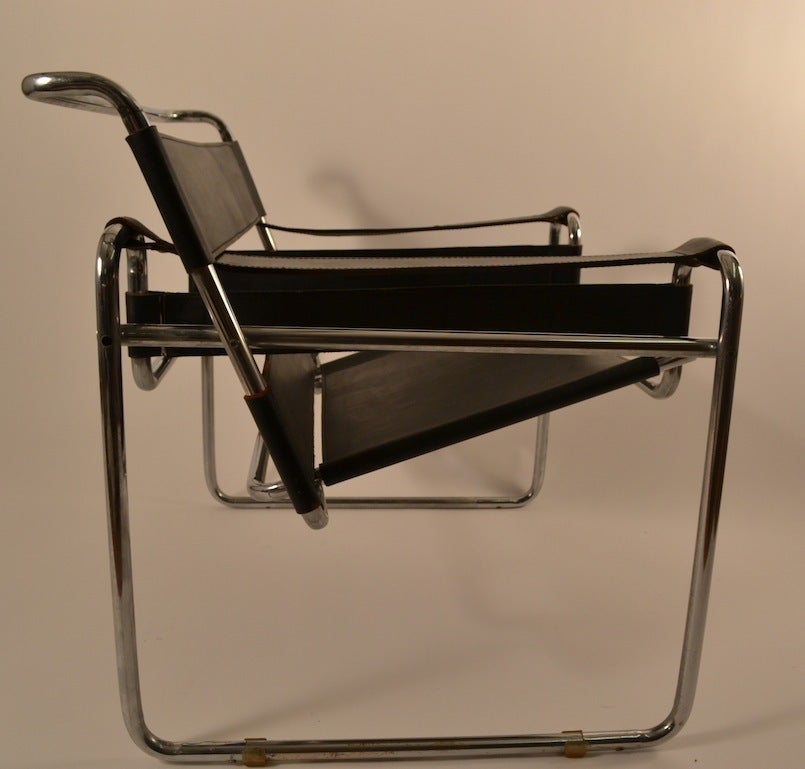 Black leather and bright chrome frames, this pair was made in Italy, Ca 1960/ 1970's. Classic International Style Wassily chair, by Marcel Breuer