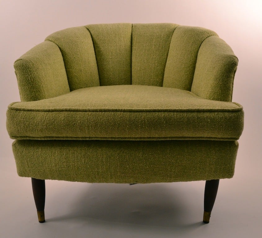 Pair Mid Century Modern upholstered tub chairs, in original green fabric. Minor wear to fabric, normal and consistent with age.