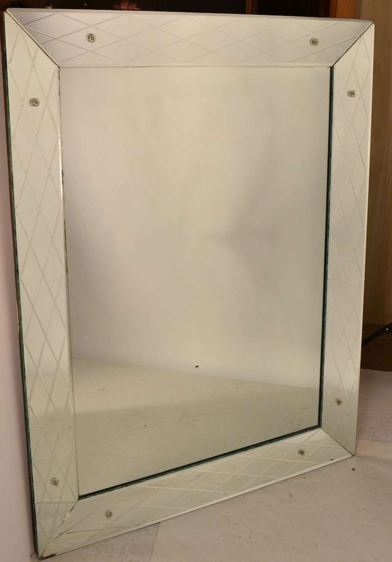 Venetian mirror, Art Deco style and period. Beautiful cross hatched diamond etching on the mirrored trim frame.