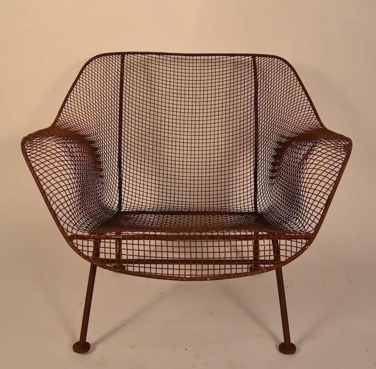 Russell Woodard Lounge Chair. Currently in later brown paint, usable as is, or powder coat, or repaint to taste. No breaks, welds, or repairs.