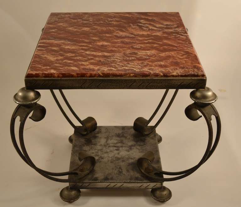 Thick bevelled marble top, steel and iron base. This interesting table once belonged to famous American movie producer John Ford. Stylish, high quality, and provenance as well.