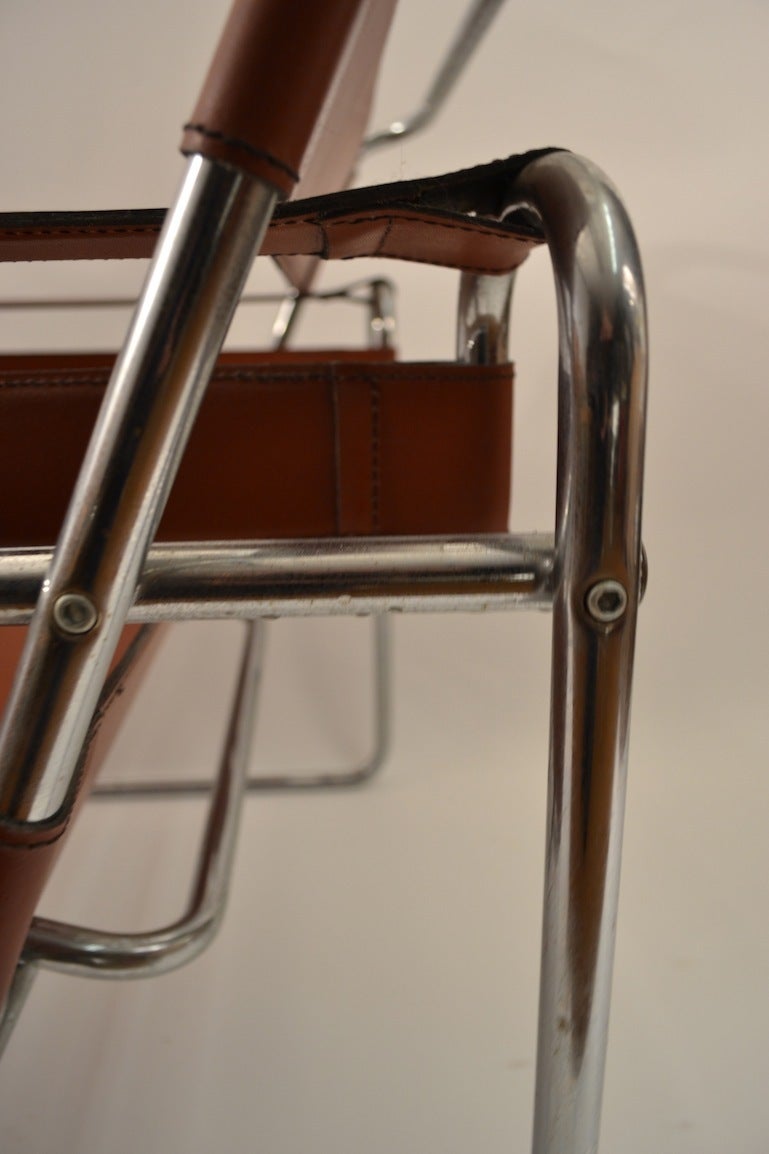 Nice clean vintage Wassily chair, brown leather with bright chrome. This chair is Ca 1970's Designed by Marcel Breuer, later production, but vintage example.