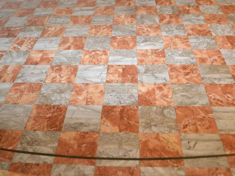 Large oval top tessellated stone checker board pattern with brass string inlay. Maitland Smith manufacture after Karl Springer.