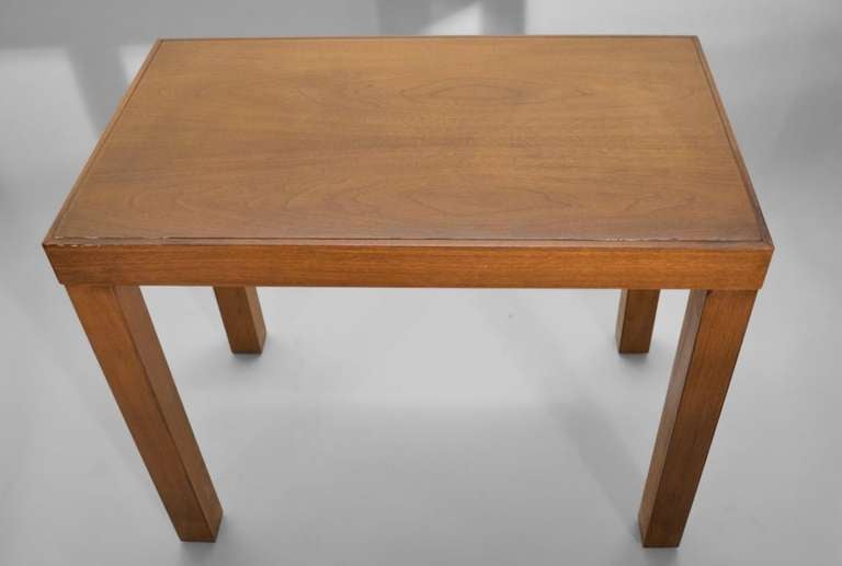 Pair of George Nelson / Herman Miller end tables. Hard to find form simple rectangular tops on square legs. We are also offering the coffee and console tables from the same collection.