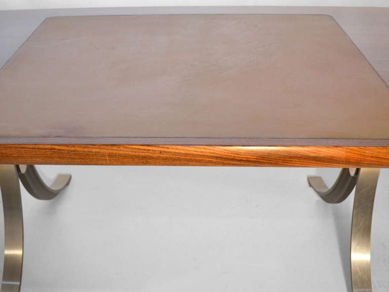 Rosewood top with leather writing surface. Measures: Top 2