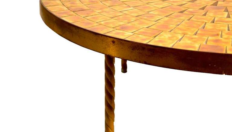 Gold tone tile done in a starburst pattern, with mosaic technique. Tile top, brass legs, Mid Century Modern Coffee Table, 