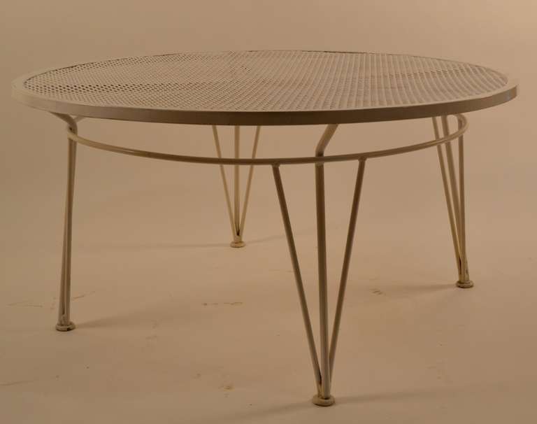 Metal mesh top, iron rod legs, suitable for indoor or outdoor use. Coffee, Cocktail or occasional table. Has been recently painted glass white.