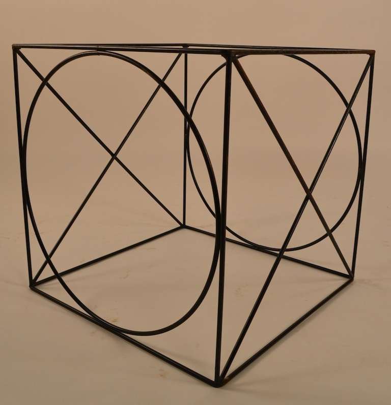 Interesting X O wire rod cube table after Weinberg, Umanoff, Risley, and Tony Paul. Currently missing the glass insert top, which is easily replaced.