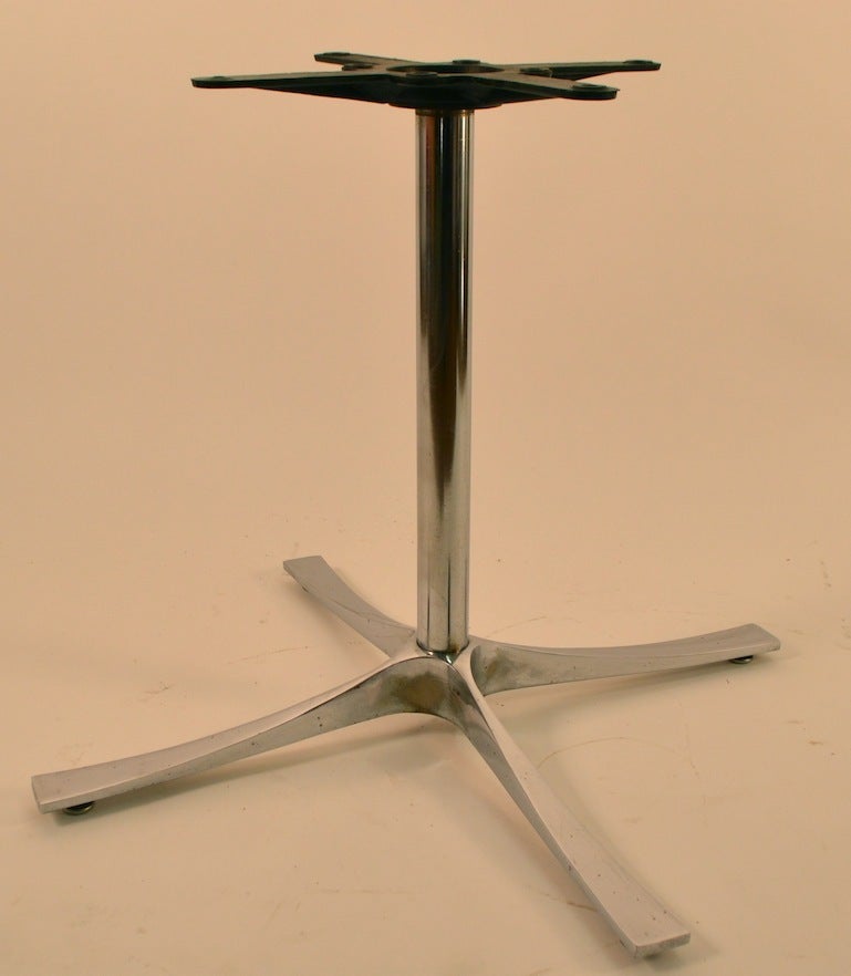 Heavy wood  butcher block top on stylish bright chrome and polished steel star form base.  Great quality possibly Italian made, slight wear to metal finish on base, normal and consistent with age.
Height of base without top attached 25.25