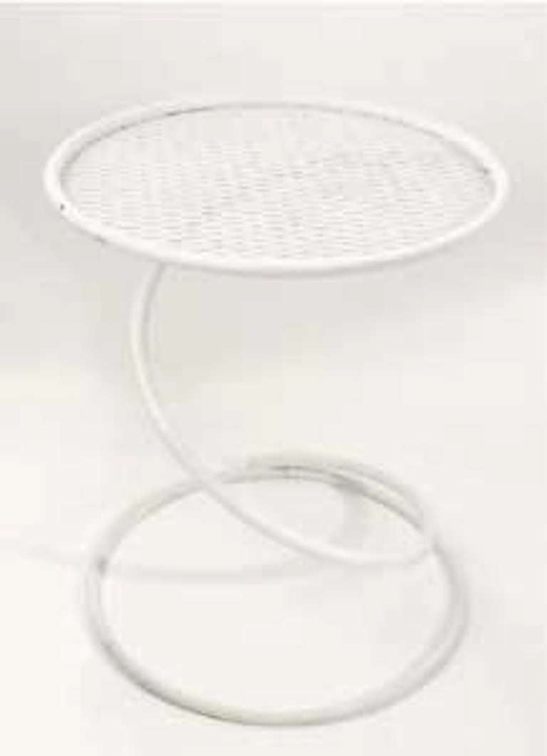 Unusual and Elegant Cork Screw Form Base with mesh top.  For indoor or outdoor use.