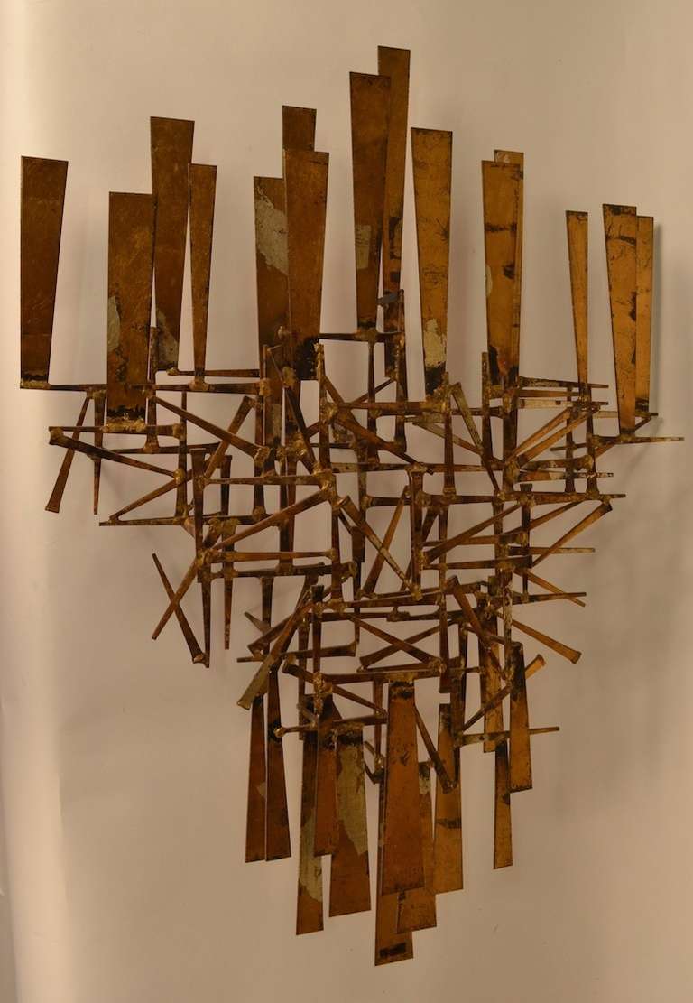 Nice example of William Bowie Brutalist Nail and torch cut metal wall mount sculpture. Signed 
