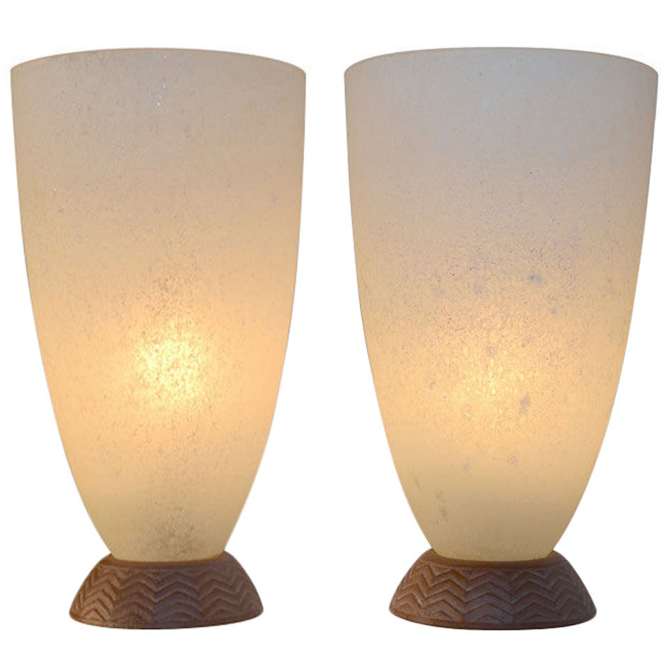 Pair Coroso Finish Murano Glass Urn form lamps attributed to Cenedese. The lamps are in the Roman Classical style, reinterpreted in the 1970/1980's. The urn form tops are in textured white glass, the plinth bases are textured coral colored  glass,