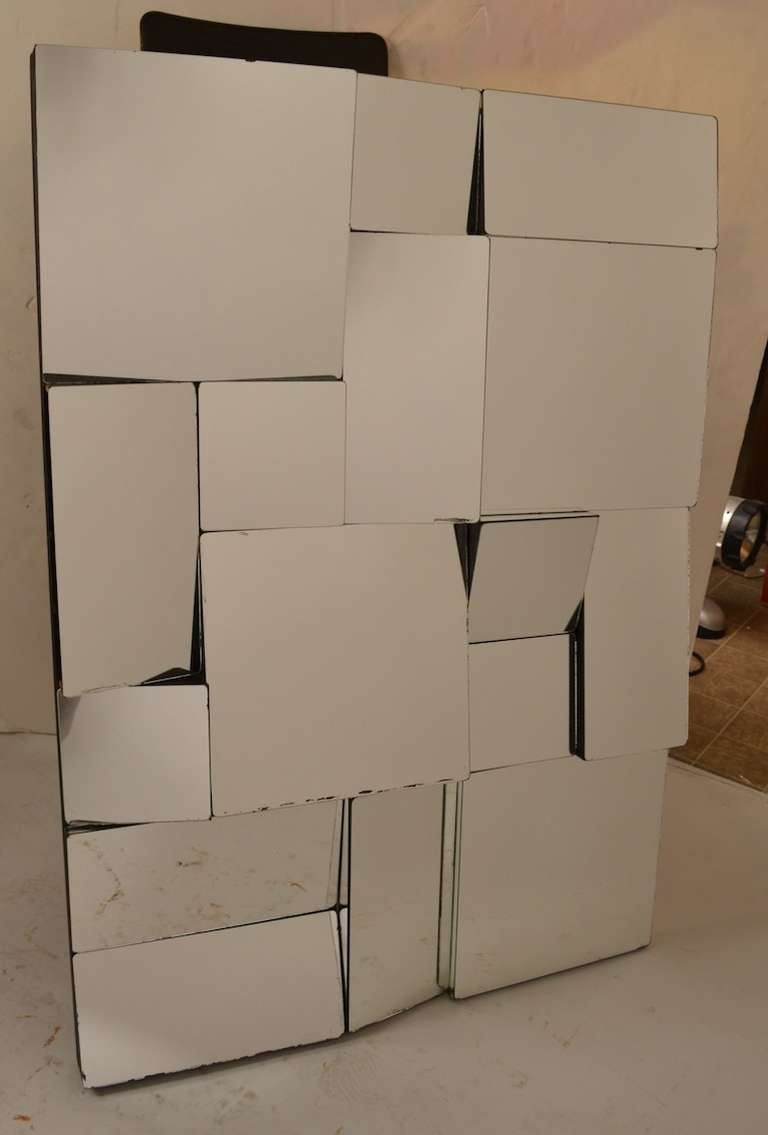 Slopes, Cubist multi plane surface wall mirror. Clear mirrored surfaces mounted in black paint wood frame.
