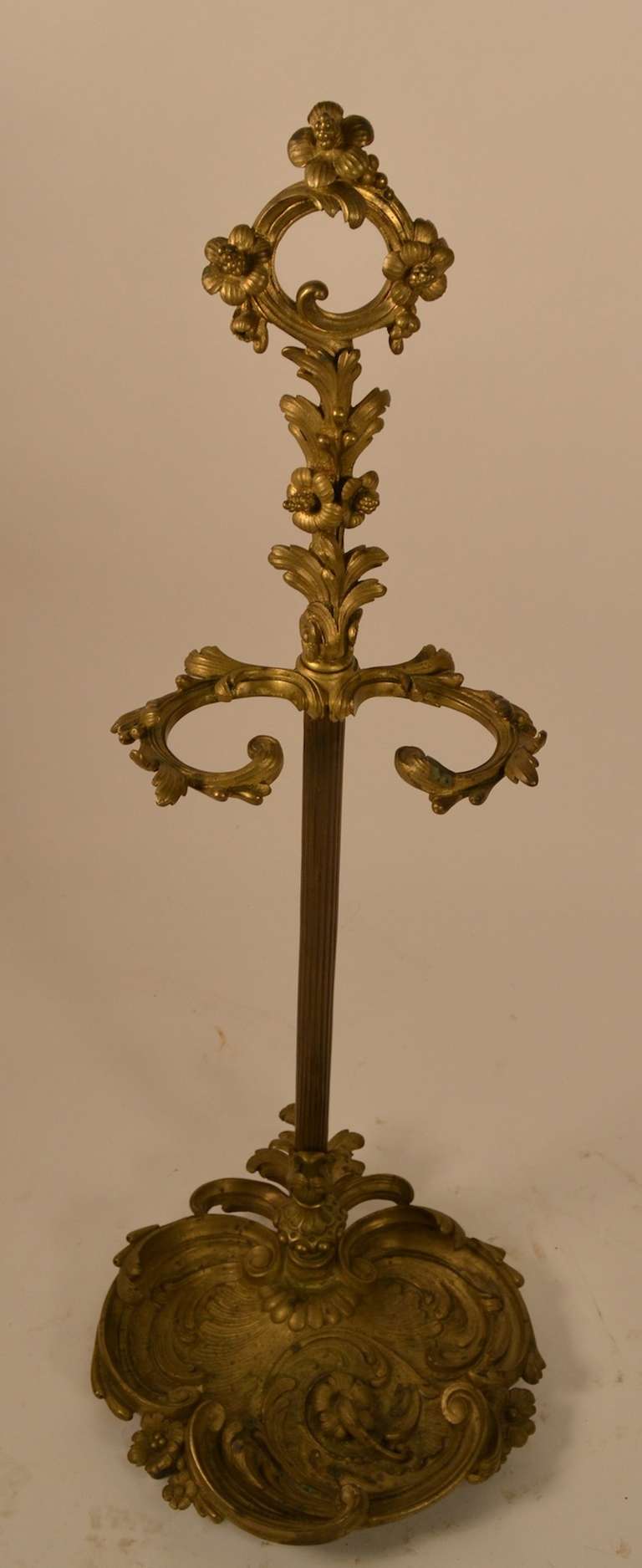 Originally designed as a fireplace tool stand, this ornate French stand can also function as a cane, or umbrella stand. Nicely detailed and well cast.