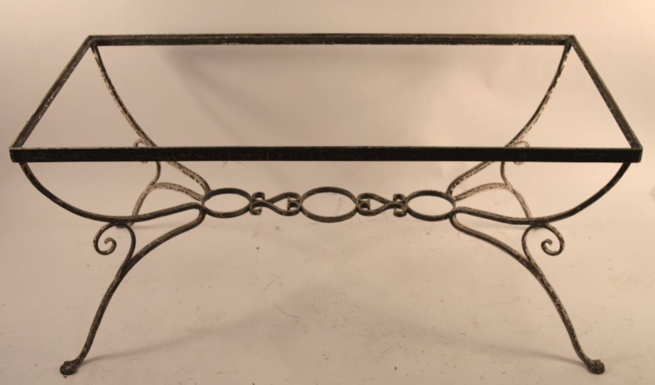 Wrought iron base with original glass top ( top not shown ) Interesting crocodile paint finish, large elegant and stylish table Suitable for indoor or outdoor use.