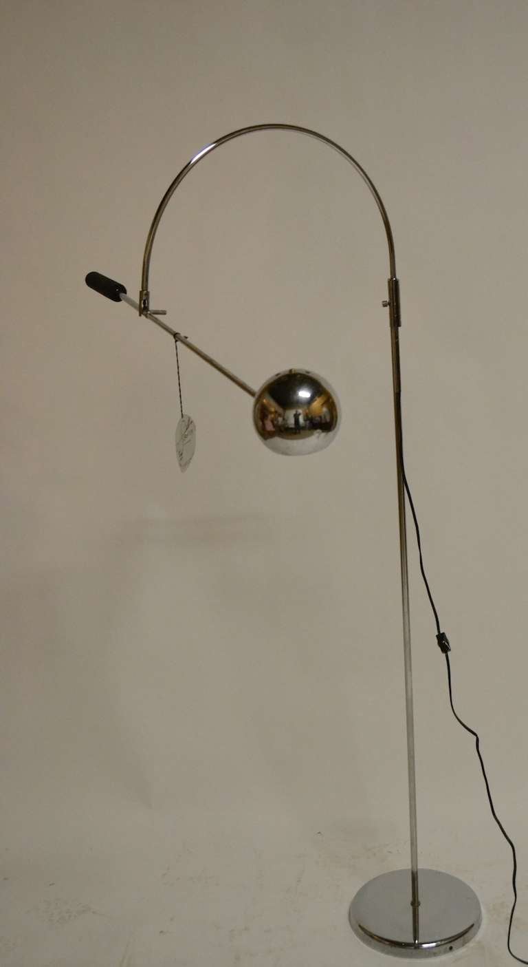 Robert Sonneman Orbiter model floor lamp. Classic infinite adjust position, chrome ball shade, chrome swing arm, adjustable height reading, work, decorative floor lamp.