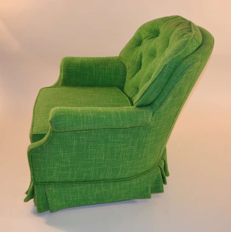 Colorful and upbeat green  uholstery, shirted bottom, loose seat cushion, tufted back. Clean, original and ready to use.